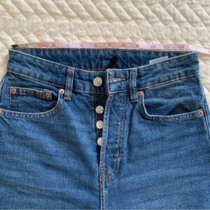 Straight leg, high waist, ripped jeans in dark blue